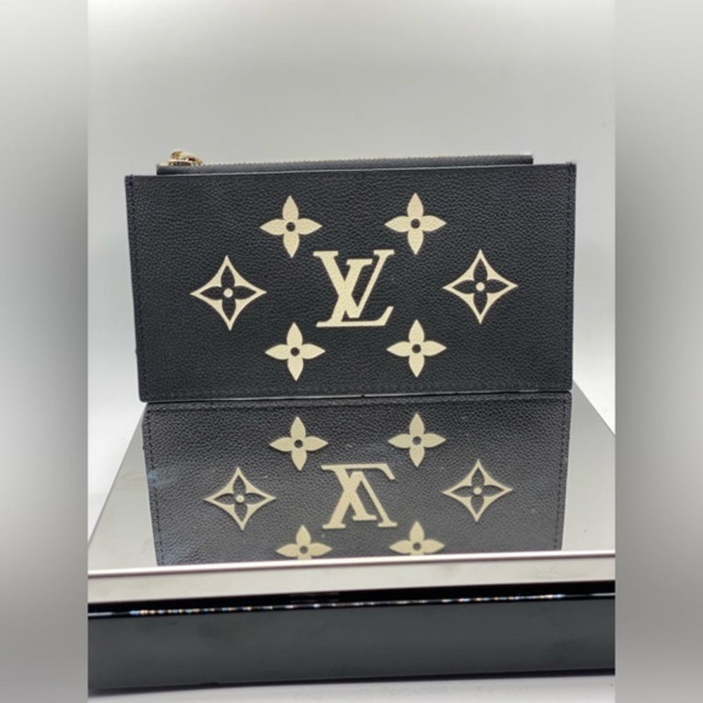LOUIS VUITTON FÉLICIE Pochette Empreinte Pouch 1/3